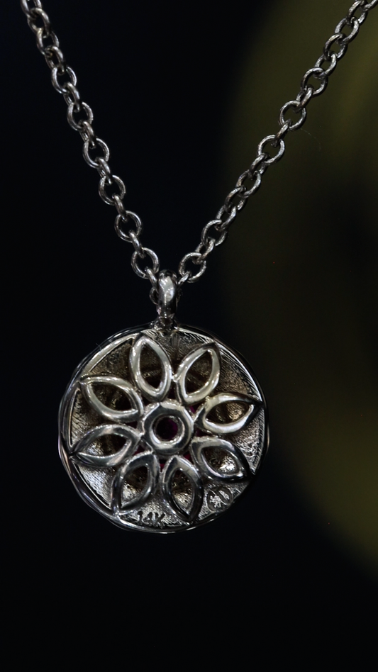 Round 0.30 carat ruby double halo pendant in 14K white gold with 0.14 carat G-H SI diamonds Houston jewelry store Endless Diamonds