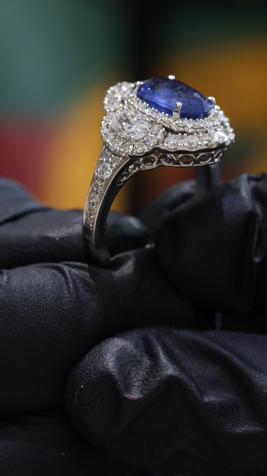 Oval Blue Sapphire Double Halo Ring with Diamond Accents | 4.41 CTW
