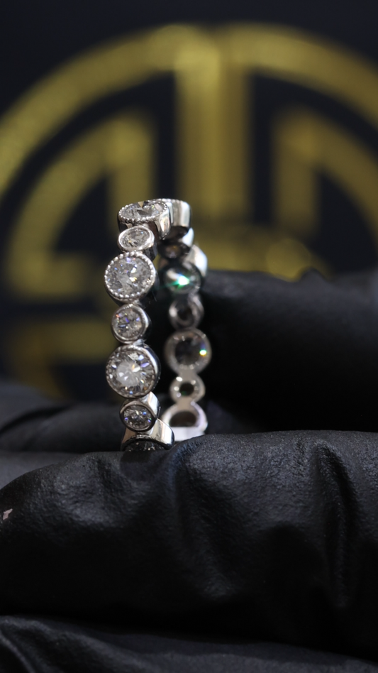 Alternating Bezel Round Diamond Eternity Band in 14K White Gold | 1.30 CT
