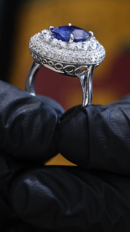 Blue Sapphire & Diamond Halo Ring in White Gold | 7.18 CTW